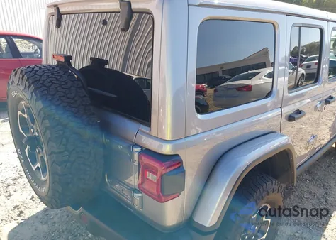 2021 Jeep Wrangler 4Xe Unlimited Rubicon 4X4 z USA, uszkodzony, nr VIN 1C4JJXR69MW643399